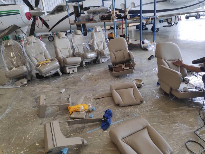 Private jet seat leather restoration